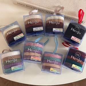 Detailed view of 5-piece seamless hair tie sets in premium gift boxes with ribbon pulls