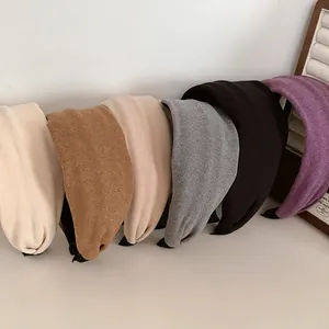 Solid color wide headband set in soft knit fabric with non-slip ends for women
