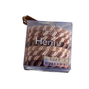 Durable high-elasticity hair ties in earth-toned woven spiral style with storage box