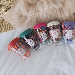 Coffret de cinq mini gobelets avec élastiques à cheveux colorés pour filles en diverses couleurs