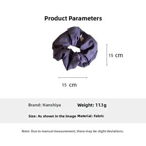 Detailed view of 15cm purple padded bow scrunchie with dimensions and weight parameters