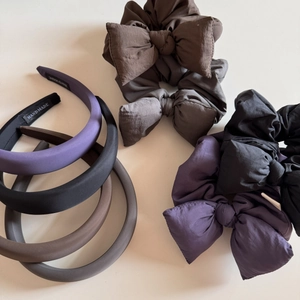 Detailed set of satin hairbands and oversized bow scrunchies in various chic autumn colors