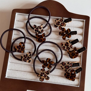 Leopard print hair accessory set with resin heart and flower duckbill clips and hair ties