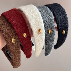 Serre-têtes en peluche hivernale en cinq couleurs avec détail métal doré