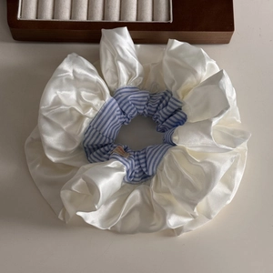 Oversized blue striped satin scrunchie with lace trim and handmade label detail