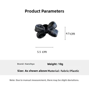 Detail view of a 5.5cm blue-grey plaid bow hair clip showing size and dimensions