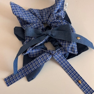 Blue vintage plaid scrunchie with denim bow and gold charm accessory for women