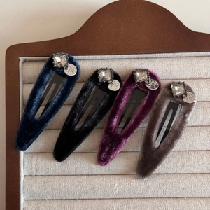Detail of velvet BB hair clips with square rhinestones and metal charms in four colors
