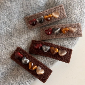 Four-piece plush brown hair clips set with 3D colorful glitter hearts for autumn winter