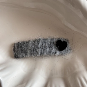 Y2K grey faux fur rectangle hair clip with a black velvet heart accent for winter hair styling