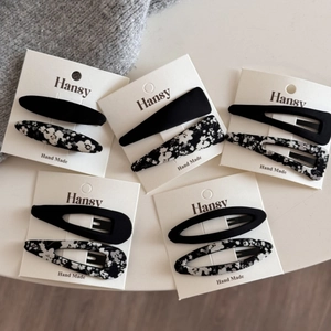Floral and solid fabric BB hair clip set featuring black and white patterns for daily wear