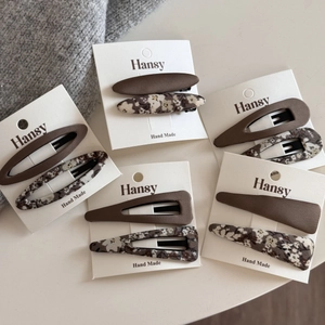 Floral and solid fabric BB hair clip set on display card for daily styling