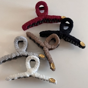 Elegant tweed fabric hair claws with gold oval logo in burgundy, black, grey, coffee, and beige