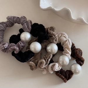 Elegant plush scrunchies with large pearl accents in grey, black, beige and brown