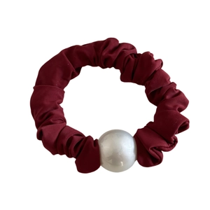 Elegant wine red hair scrunchie with a large white pearl bead for stylish hair styling