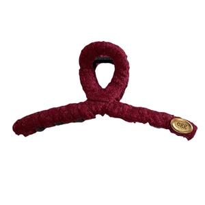Elegant deep red tweed hair claw clip with a golden oval egg engraving metal tag