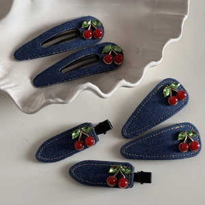 6-piece set of blue denim hair clips featuring red cherry rhinestones and yellow stitching