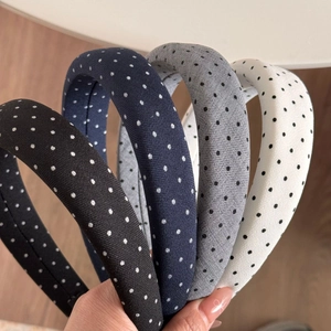 Set of padded polka dot headbands in black navy and white for a vintage look