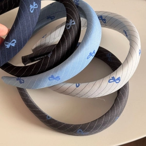 Set of padded headbands with elegant twill fabric and blue bow pattern designs