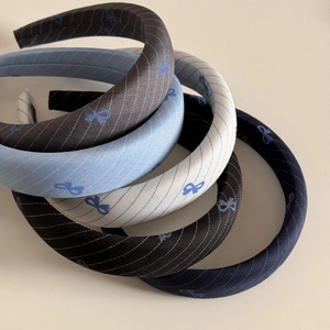 Padded blue bow headbands set with twill fabric texture and sweet elegant design