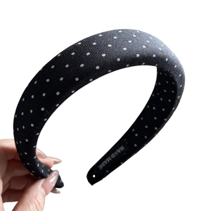 Handmade black and white polka dot padded headband with glossy silk texture for women