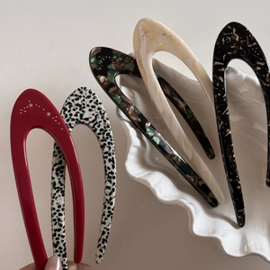 Elegant set of U-shaped acetate hair forks with rhinestone accents in five colors