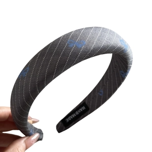 Blue bow hairband with white twill pattern, handmade hair accessory for a stylish look