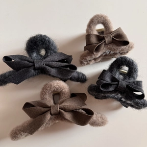 Chic plush fabric bow hair claw clips in dark grey and coffee brown for women