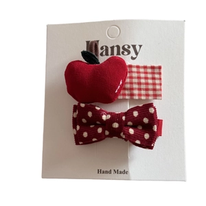 Lot de barrettes rouges avec nœud à pois et motif pomme pour une coiffure festive de Noël