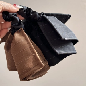Three-piece set of large striped hair scrunchies in brown and black fabric