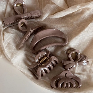 Set of six chocolate water ripple hair claws with elegant marble patterns and gold springs