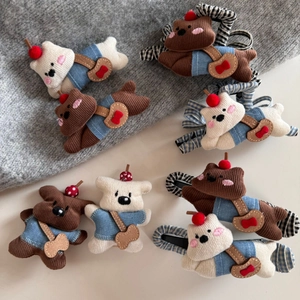 Cute plush bear hair clip set with blue sweater and cherry detail on gray knit base
