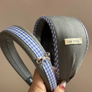 Blue plaid and grey fabric scrunchies featuring a silver bow and pearl accents