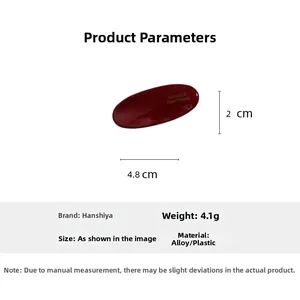 Detail showing red oval hair clip dimensions 4.8cm by 2cm with weight and material specs