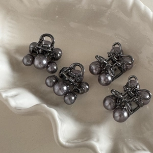 Set of 4 dark grey pearl hair claws in gunmetal finish for elegant hairstyling