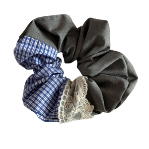 Blue plaid and grey fabric scrunchie with white lace trim for hair styling