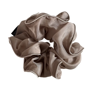 Elegant champagne organza scrunchie with white piping for stylish hair styling