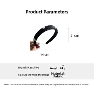 Detail view of black embroidered headband showing 14cm width and 2cm thickness dimensions