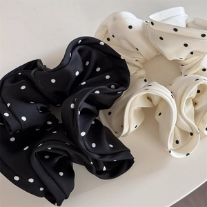 Set of two satin polka dot scrunchies in black and beige for high ponytails