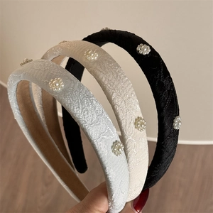 Three-piece set of floral pearl embroidered sponge headbands in black, beige, and blue
