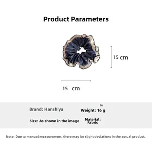 Detailed view of blue checkered scrunchie showing 15cm size dimensions and fabric texture