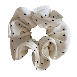 Elegant beige polka dot satin scrunchie hair tie for women with stylish bun hair accessories
