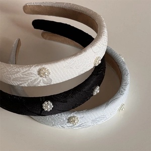 Three Chinese style embroidered pearl flower headbands in beige, black, and light blue colors