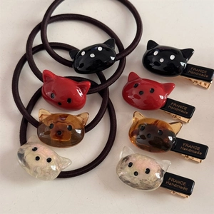 Set d'accessoires cheveux tête de chat comprenant élastiques et pinces en quatre couleurs