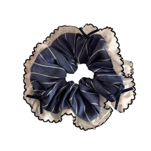 Elegant blue and white striped scrunchie with layered ruffles and navy satin bows