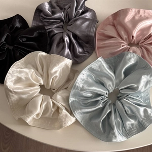 Set of five large French vintage satin scrunchies in glossy black, grey, pink, cream, and blue