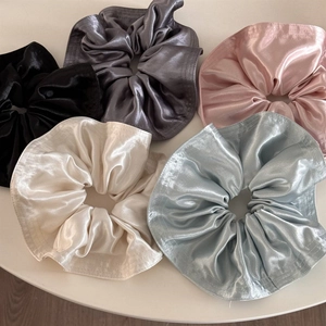 Five-piece set of elegant satin silk scrunchies in neutral and pastel colors for women