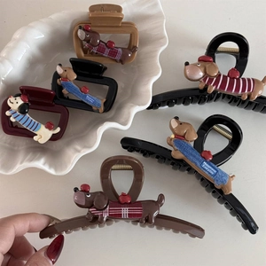 Cute cartoon dachshund dog hair claw clips in various colors displayed on a white shell plate