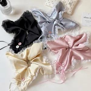 Satin scrunchie with lace edge and silk ribbon bow in four soft pastel colors