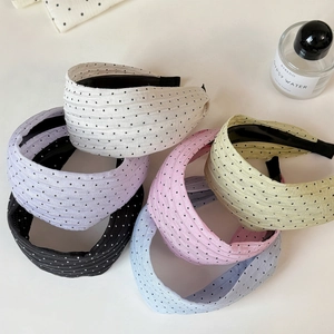Polka dot pleated wide headband set in colorful fabric for a sweet summer style